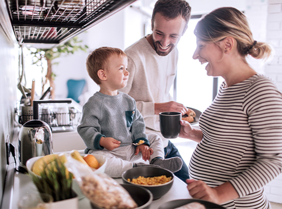 Family enjoying breakfast together in the kitchen